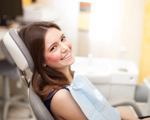 Female Patient Lying In Dentists Chair Img